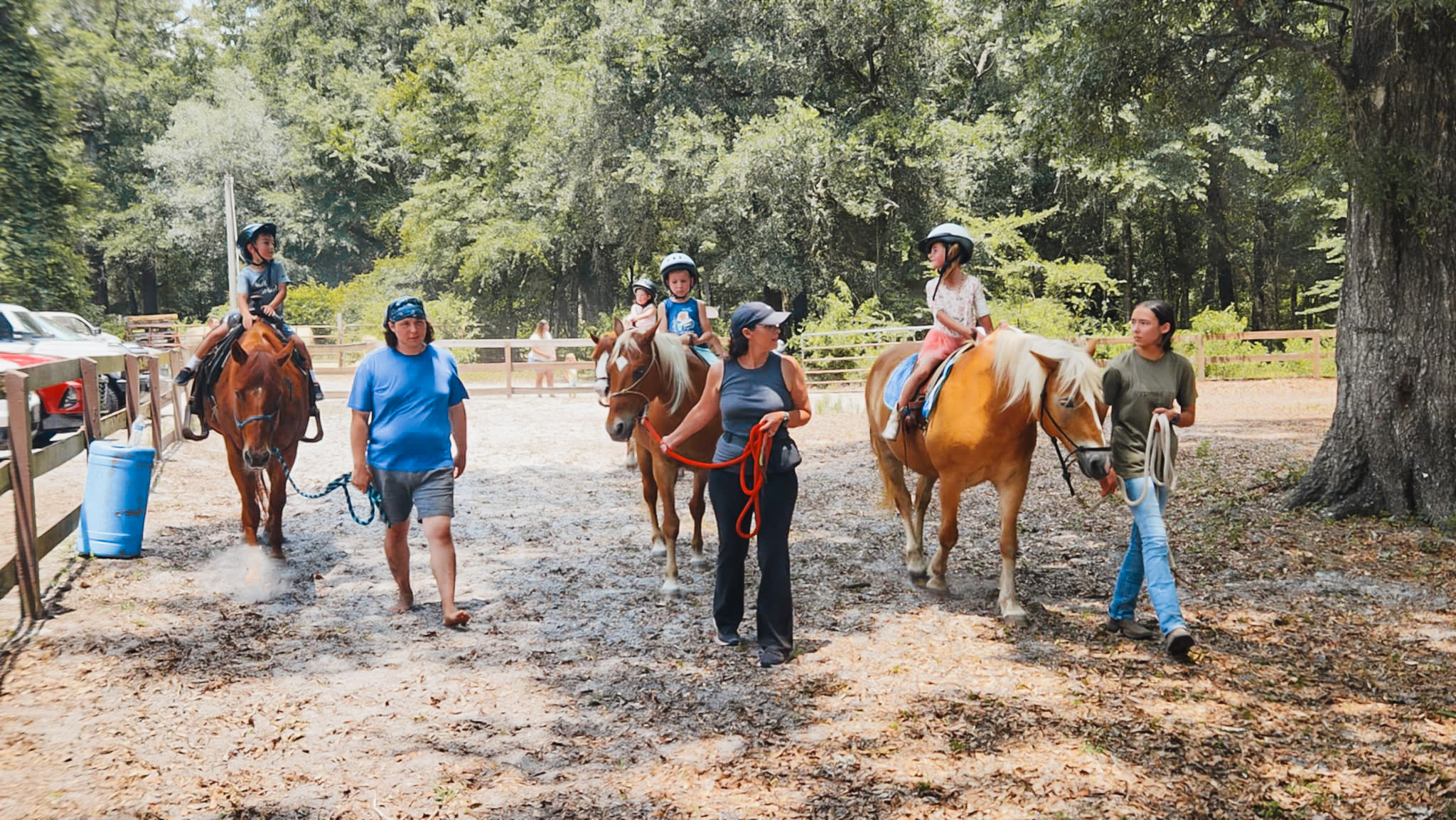 Children riding horses